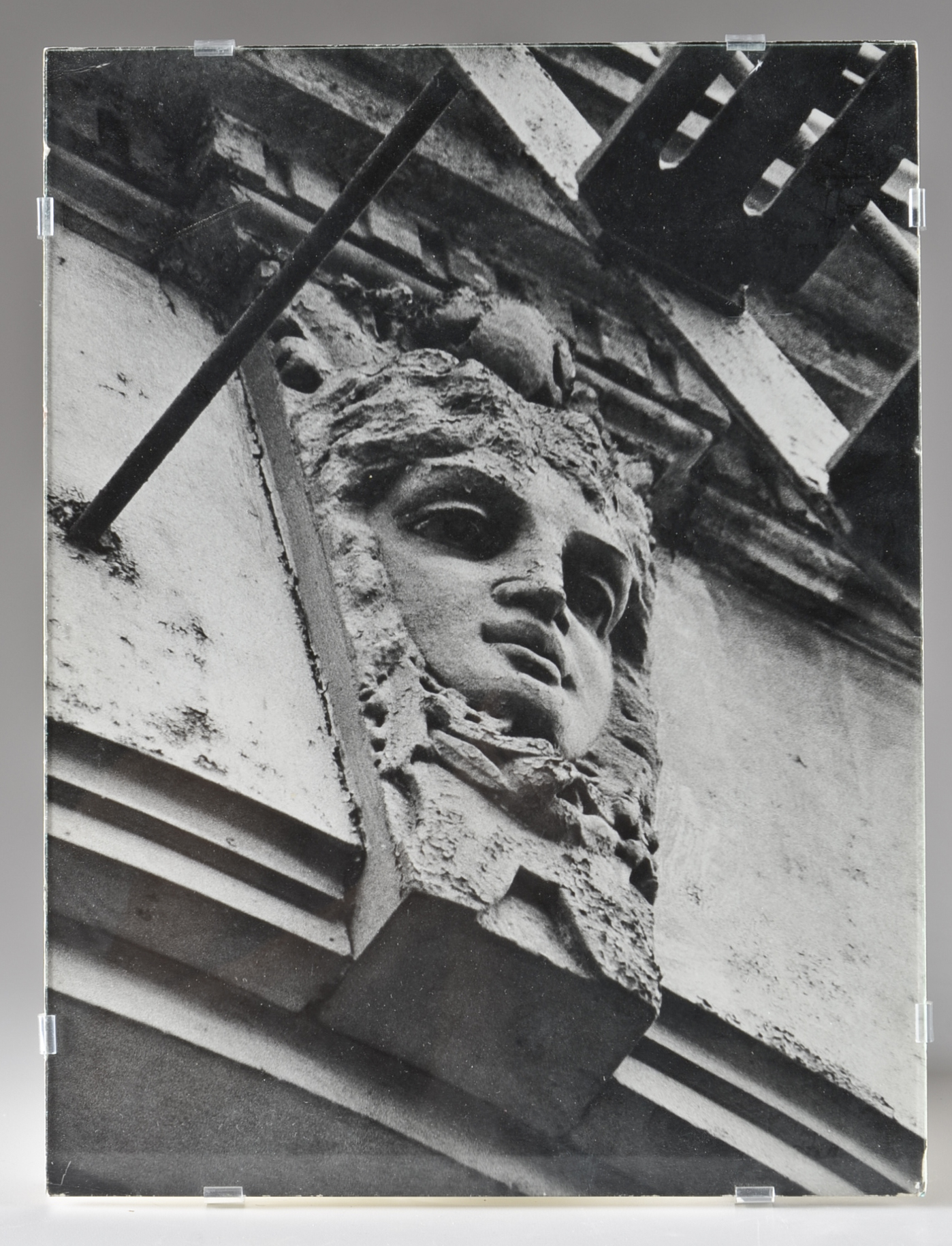 Pair of Photographs of Stone Carvings Under Glass