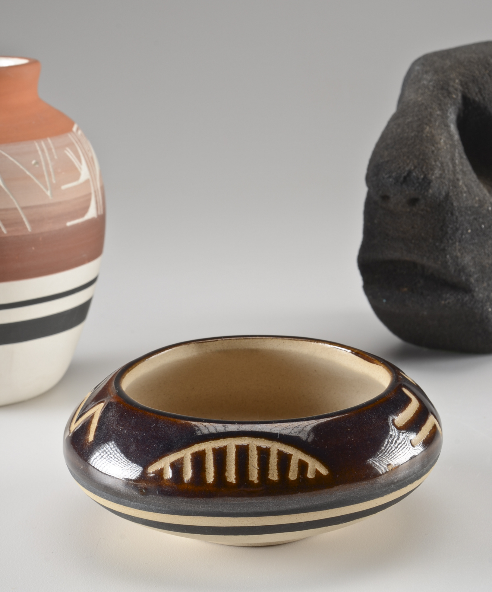 Pair of Native American Pottery and Black Sculpture