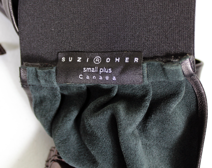 Assortment of Belts, Cosmetic Bags, Evening Gloves, and Wallets