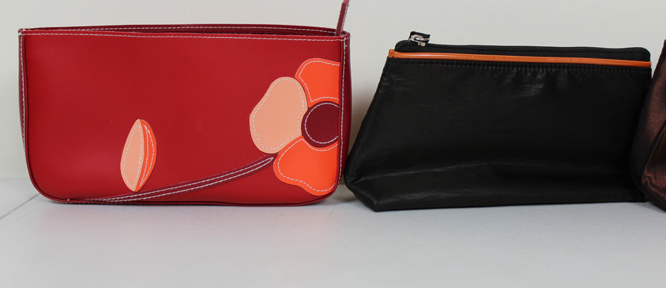 Assortment of Belts, Cosmetic Bags, Evening Gloves, and Wallets