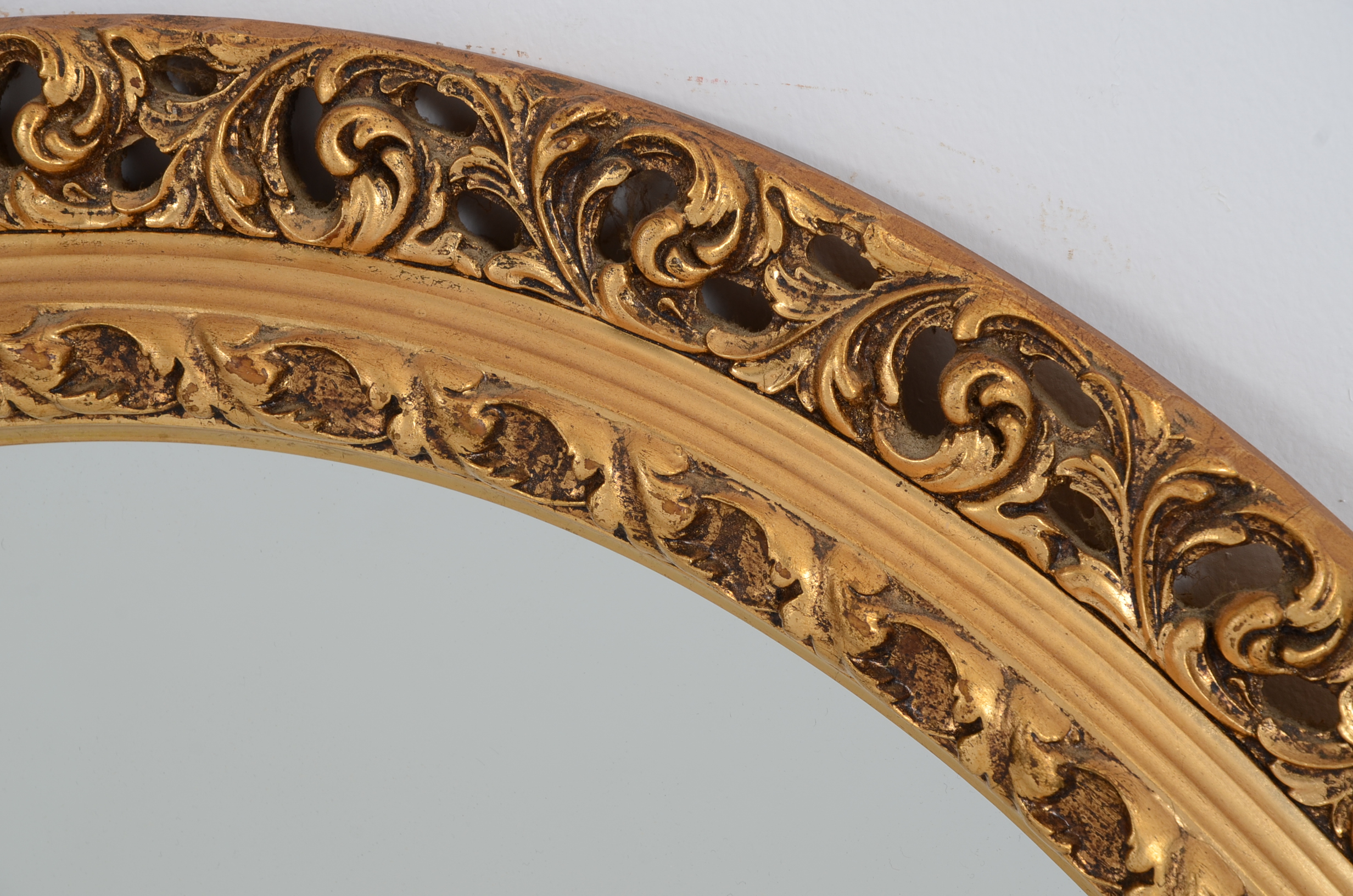 Ornately Framed Oval Wall Mirror
