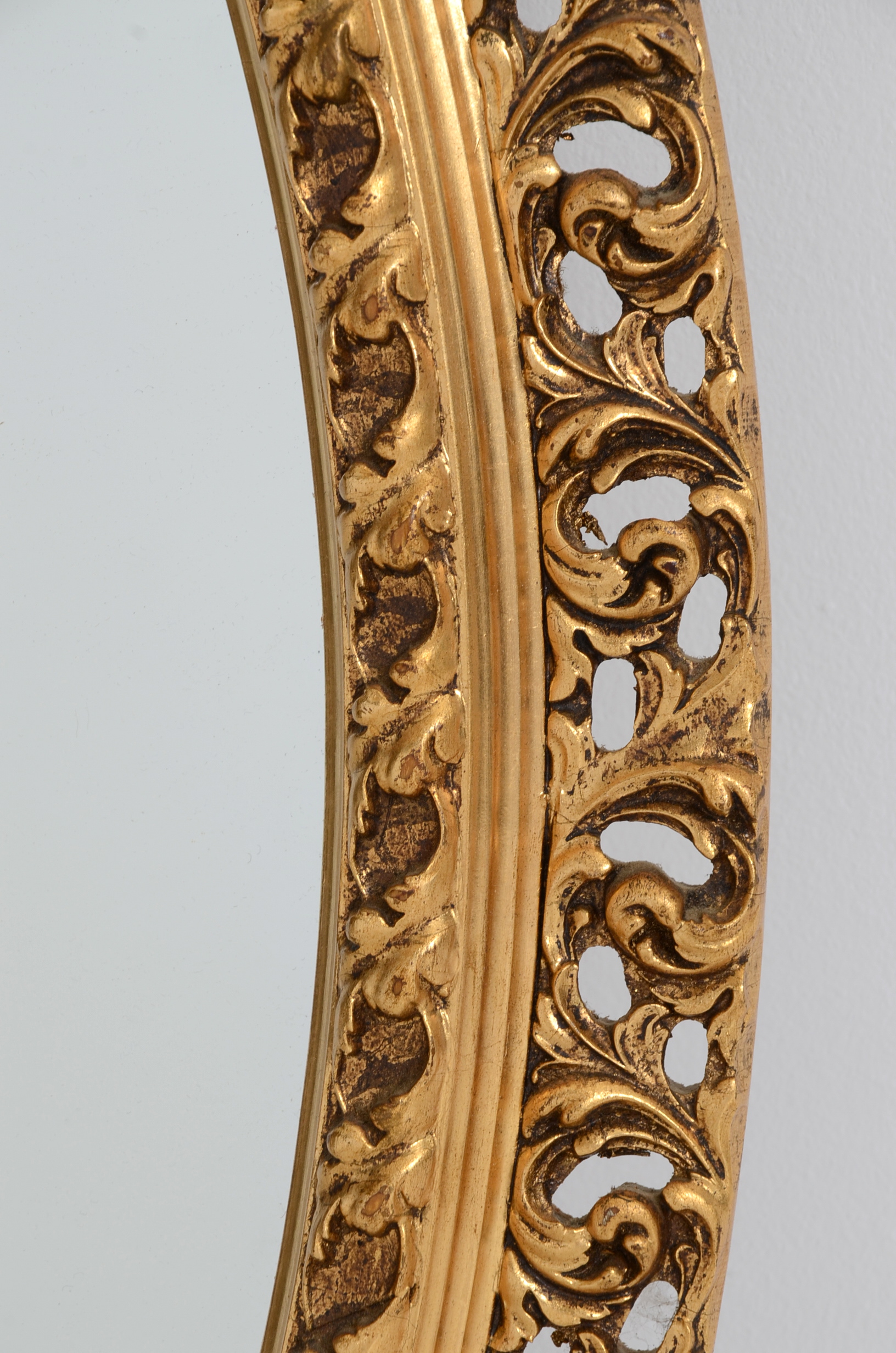 Ornately Framed Oval Wall Mirror