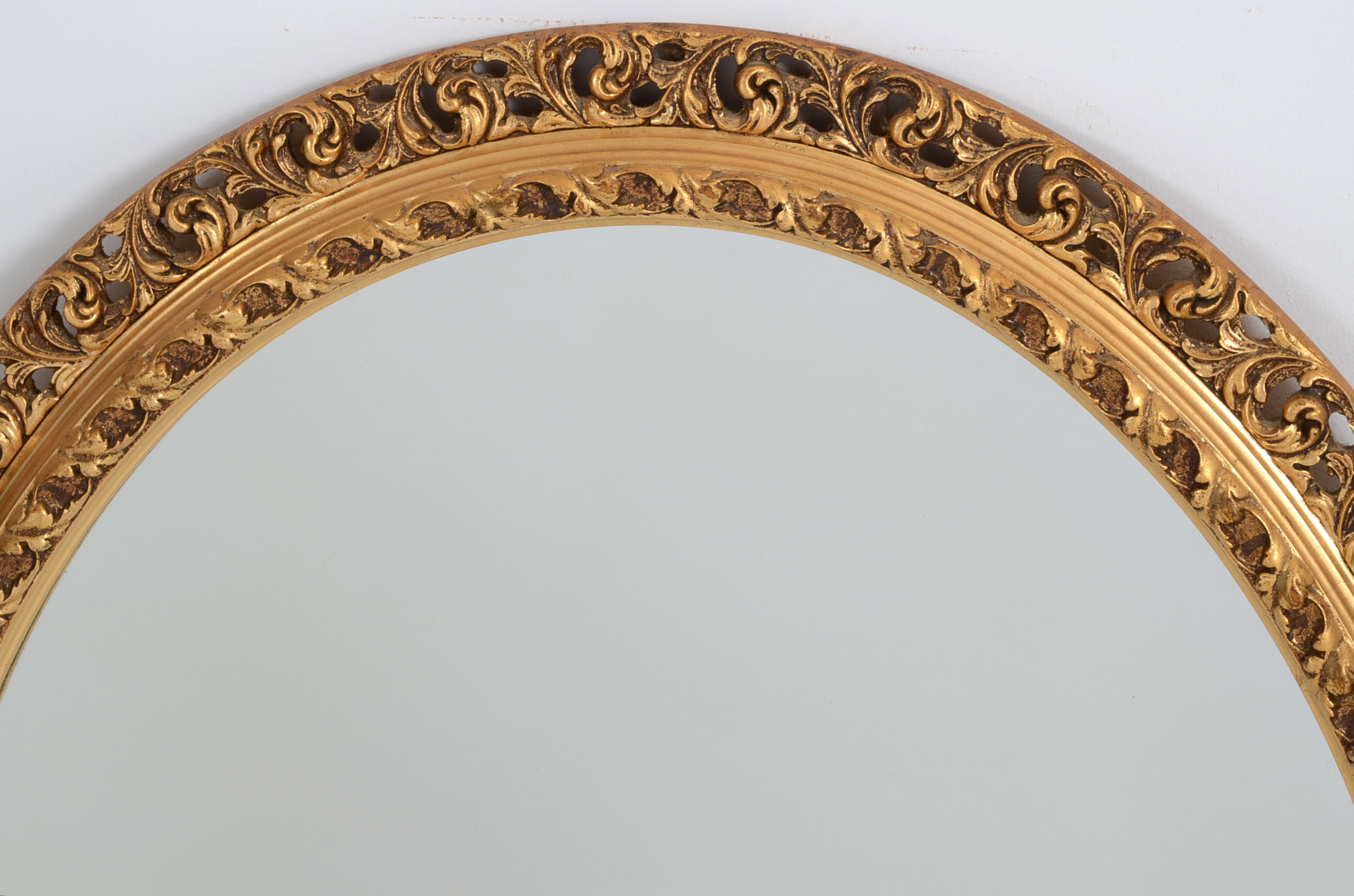 Ornately Framed Oval Wall Mirror