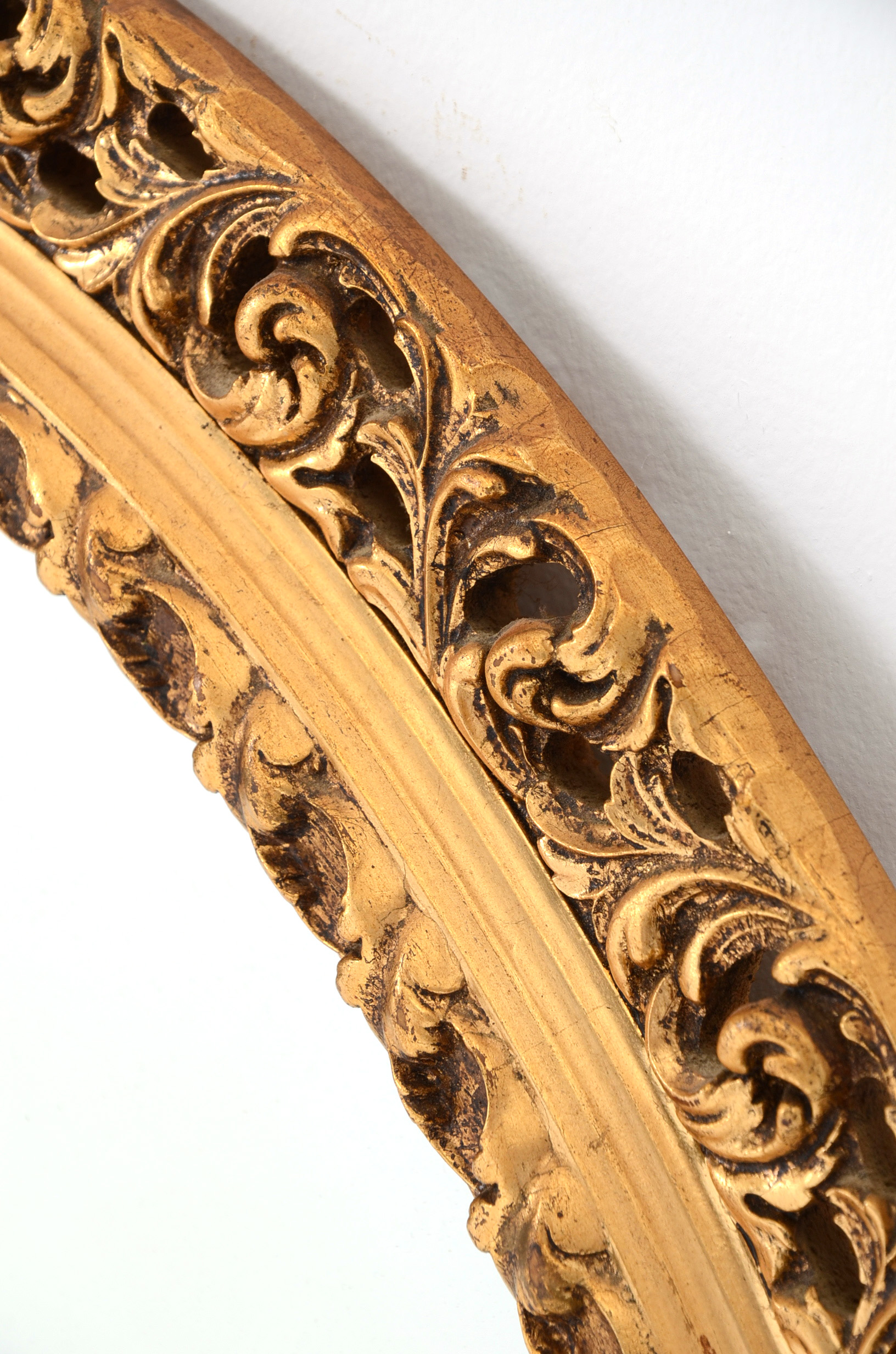 Ornately Framed Oval Wall Mirror