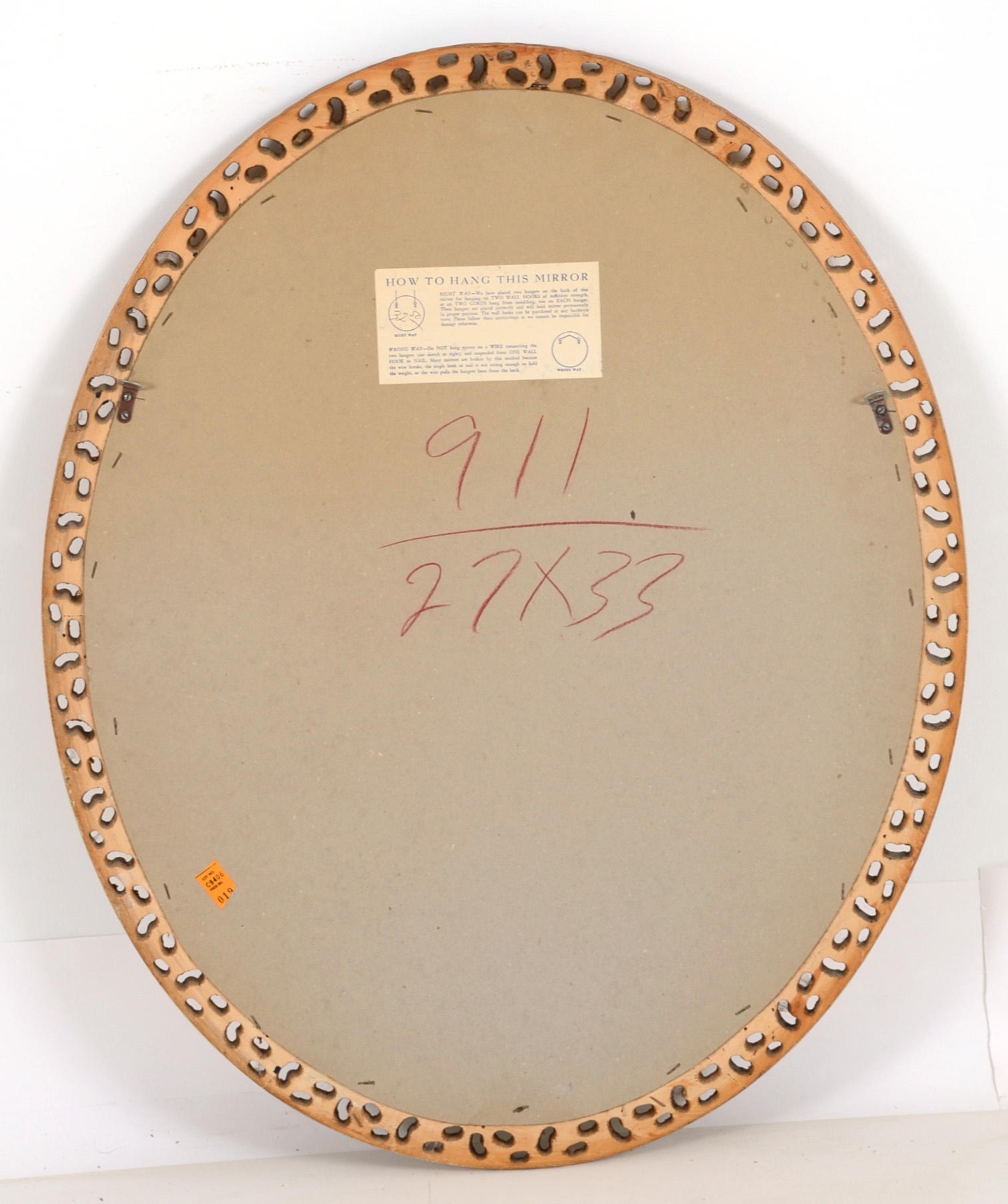 Ornately Framed Oval Wall Mirror