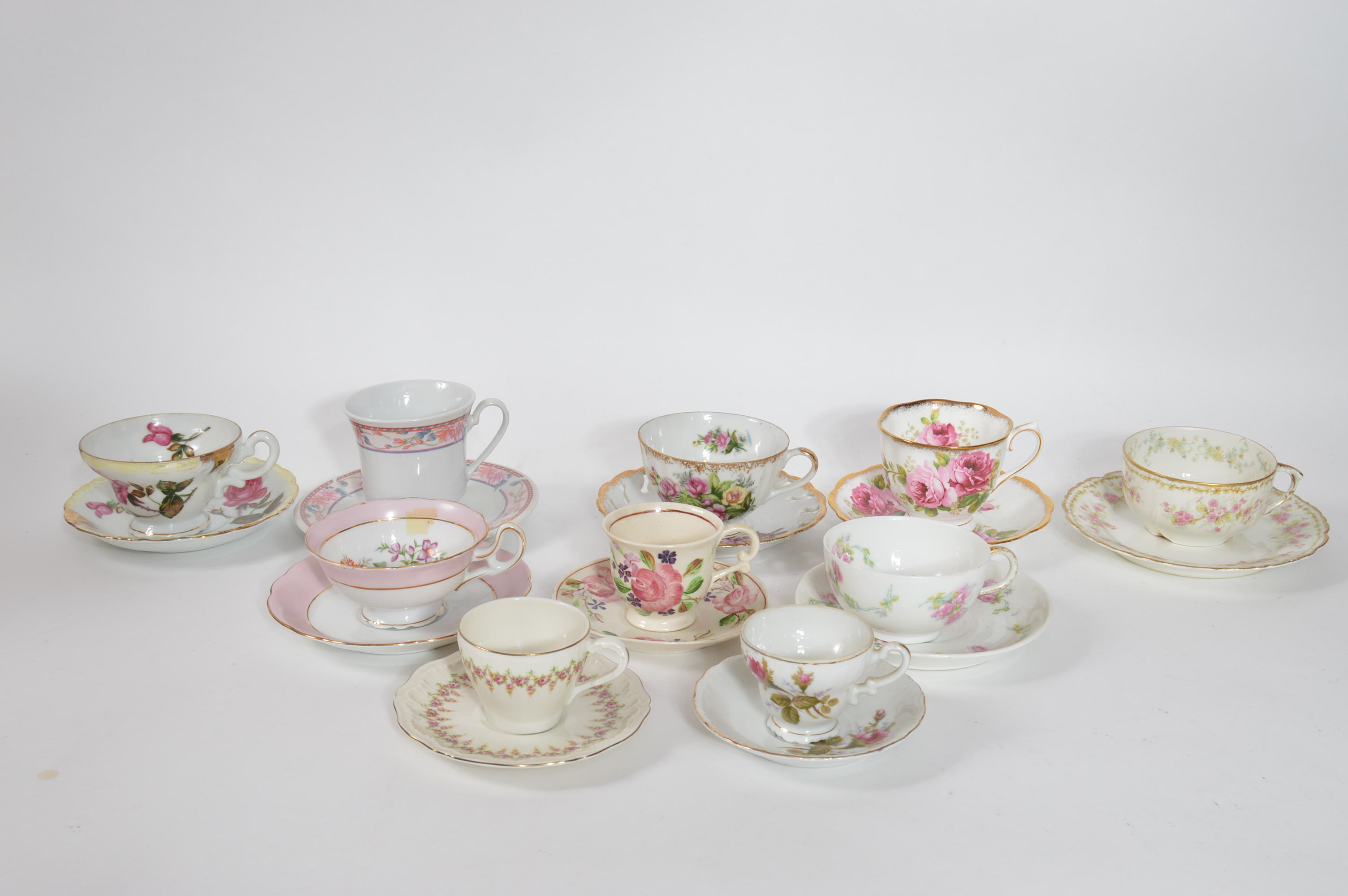 Assorted Fine China Teacups and Saucers