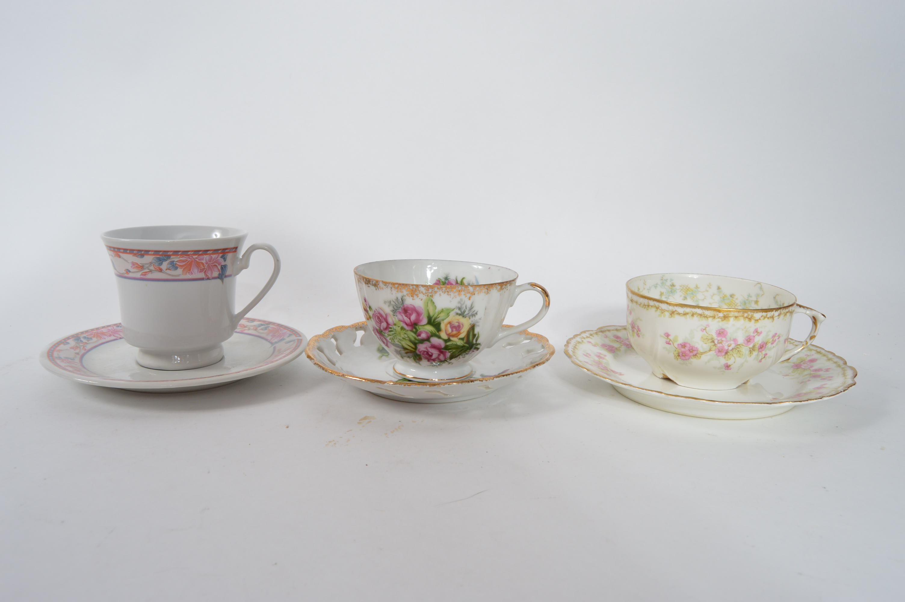 Assorted Fine China Teacups and Saucers