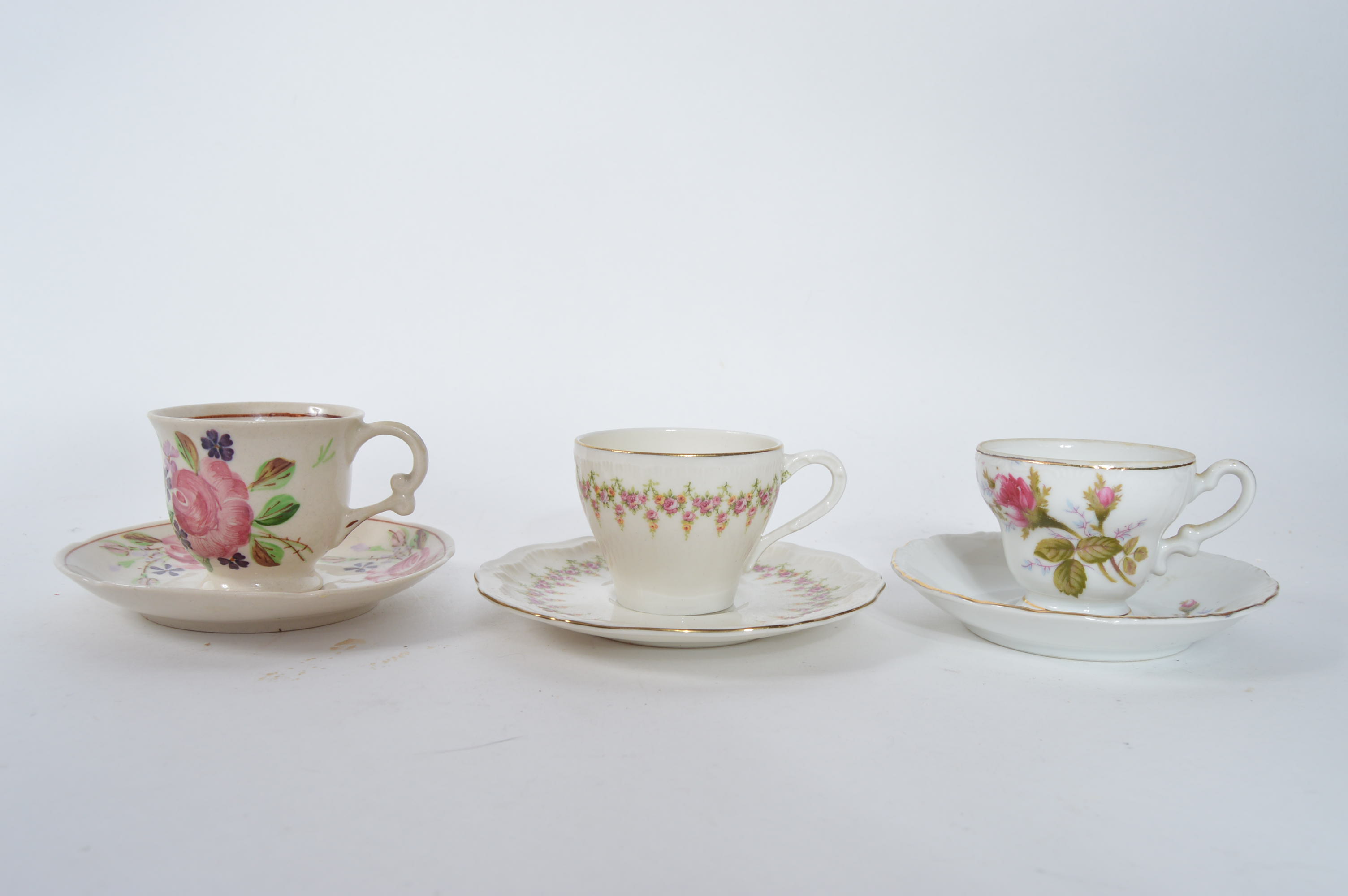 Assorted Fine China Teacups and Saucers