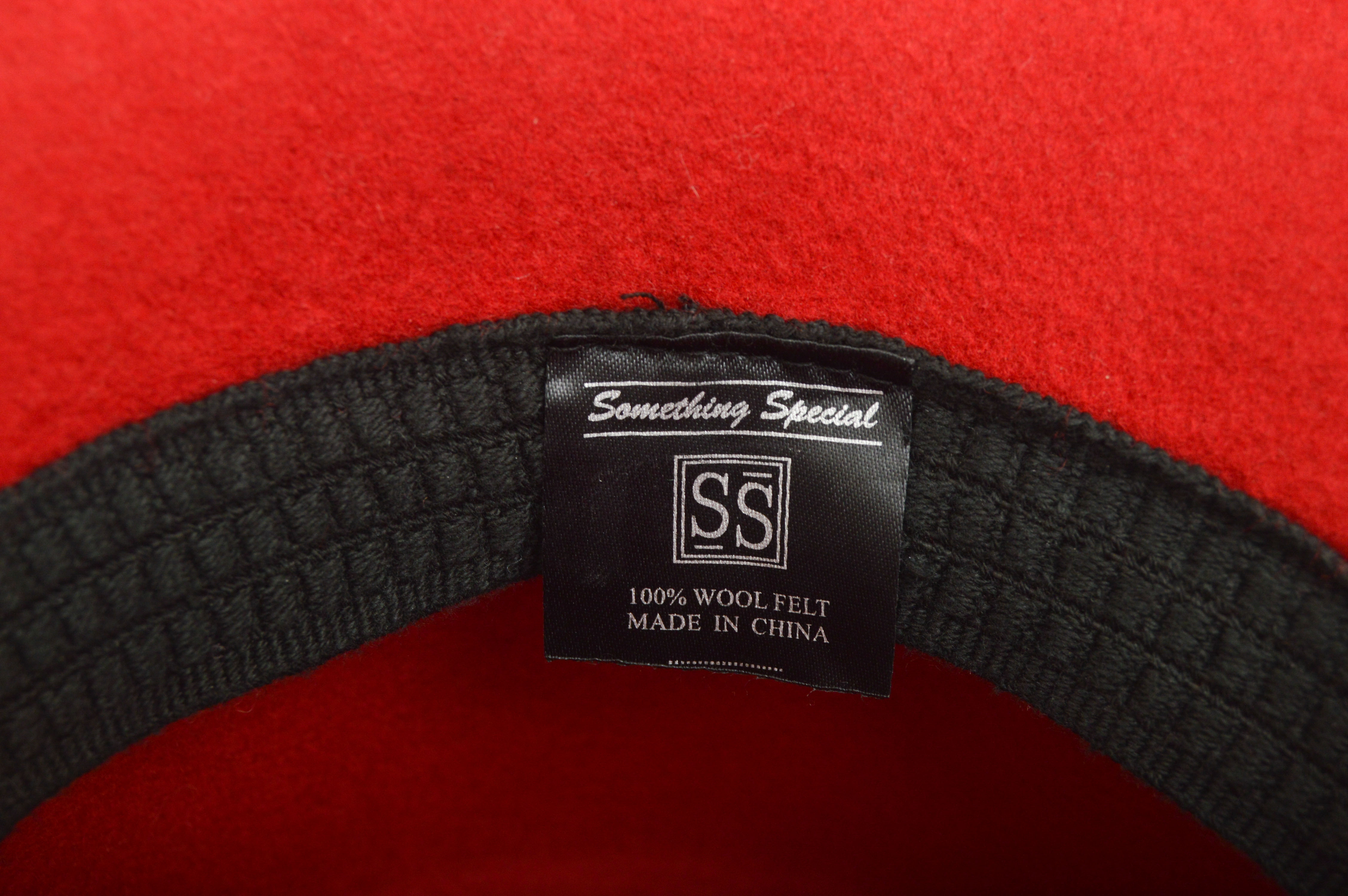 Red Feathered Derby Hat