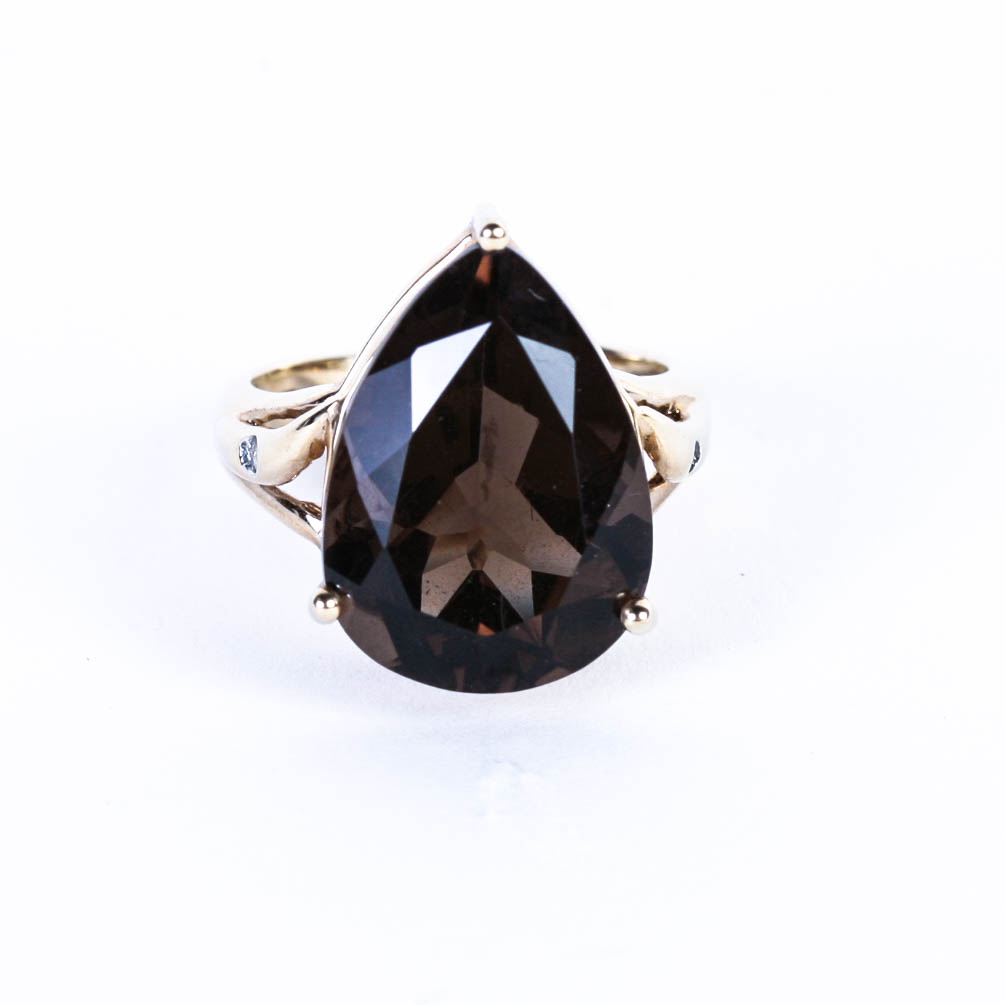 10 KT Gold Pear Cut Faceted Citrine and Moissonite Ring