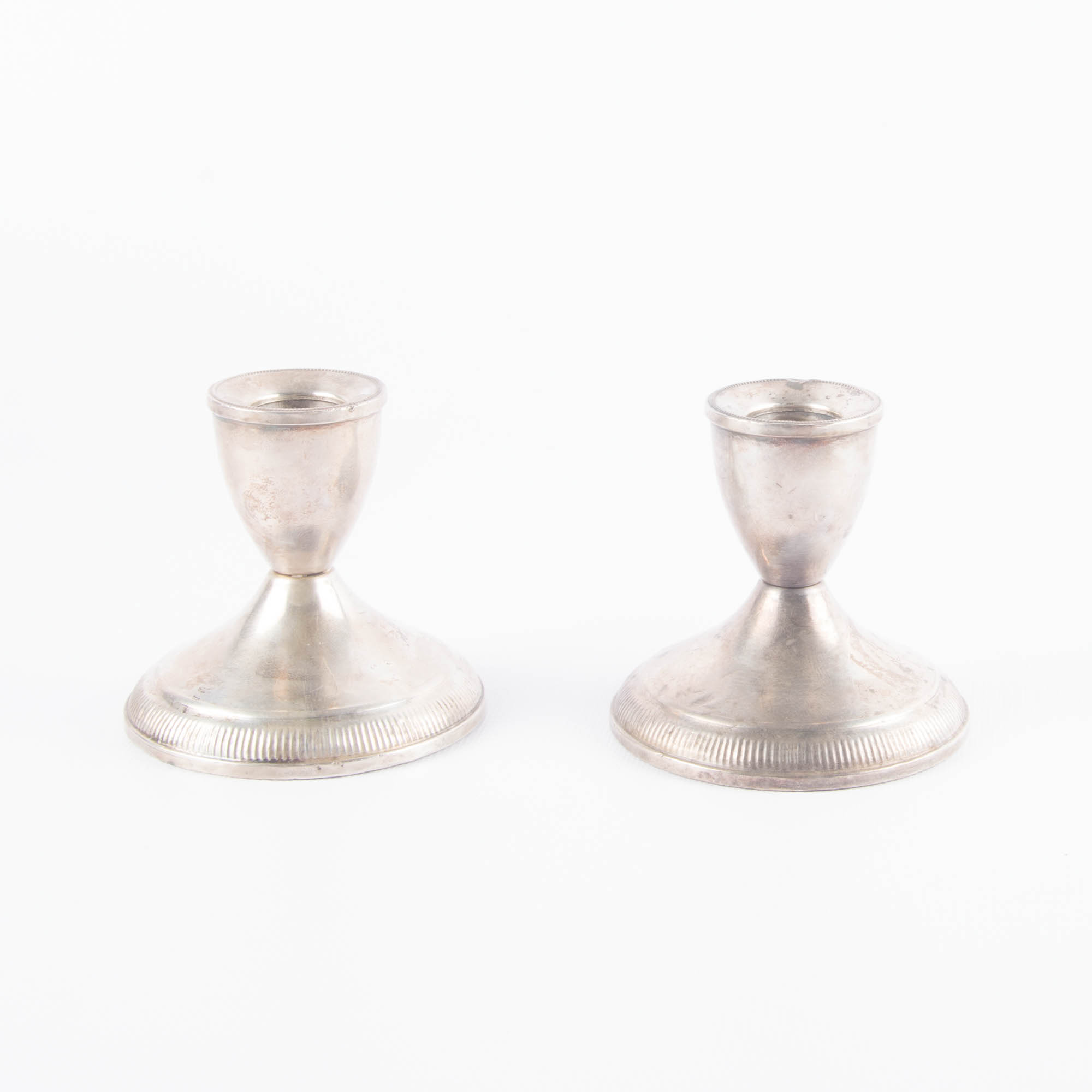Pair of Weighted Sterling Silver Candlesticks