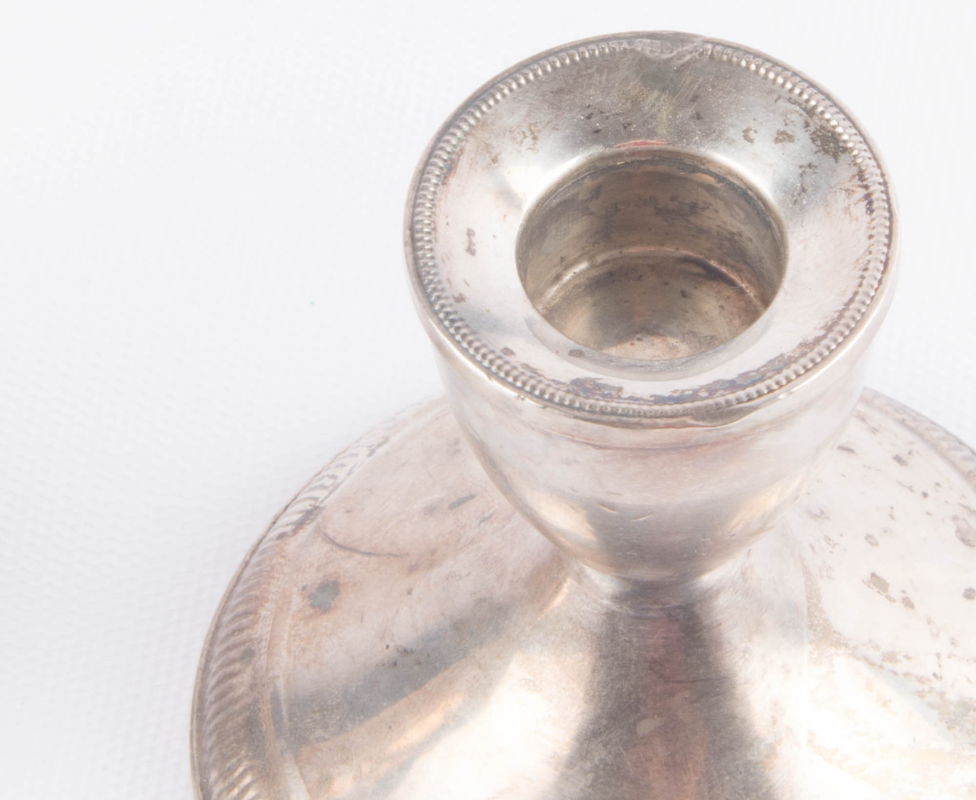 Pair of Weighted Sterling Silver Candlesticks