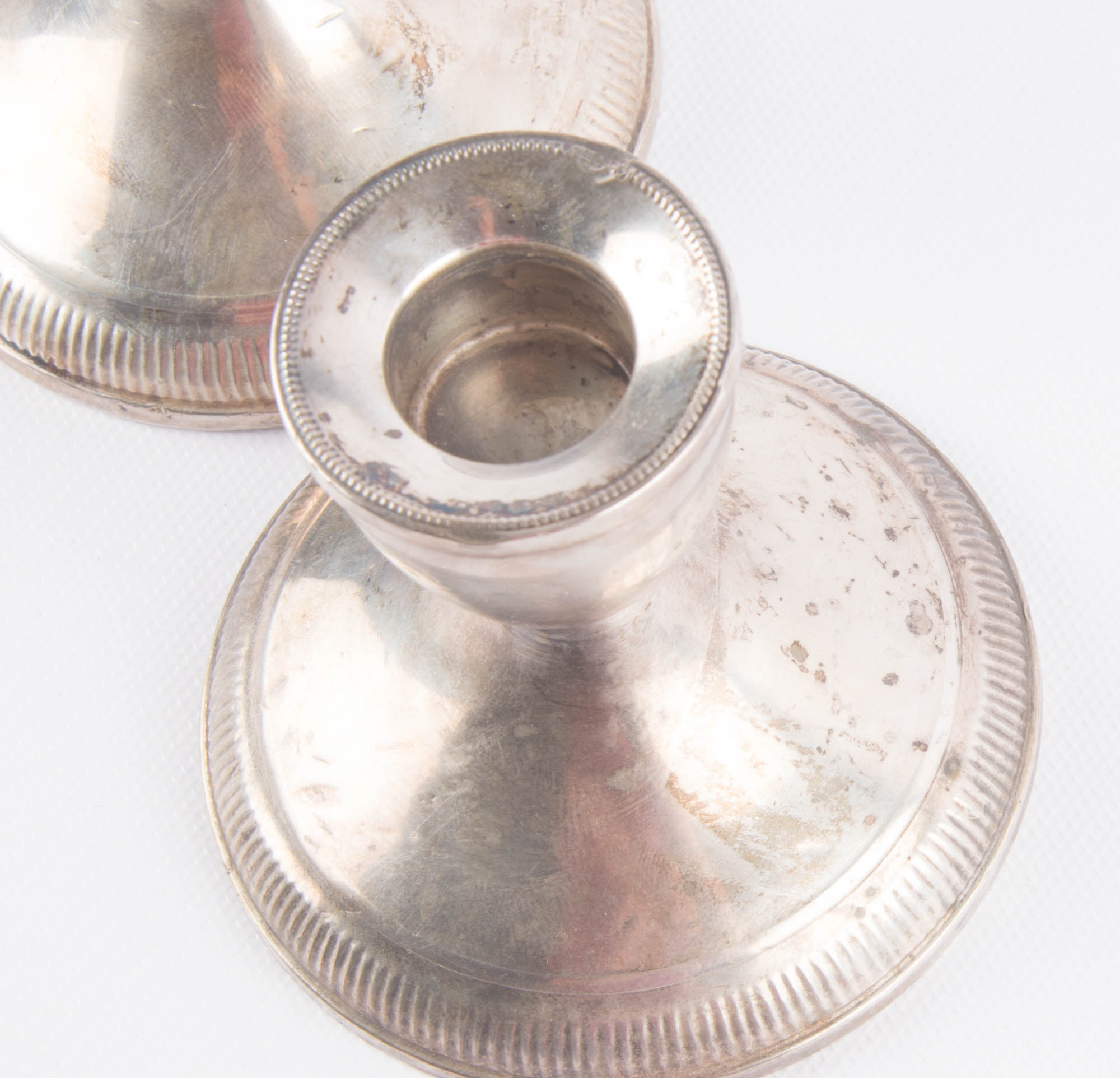 Pair of Weighted Sterling Silver Candlesticks