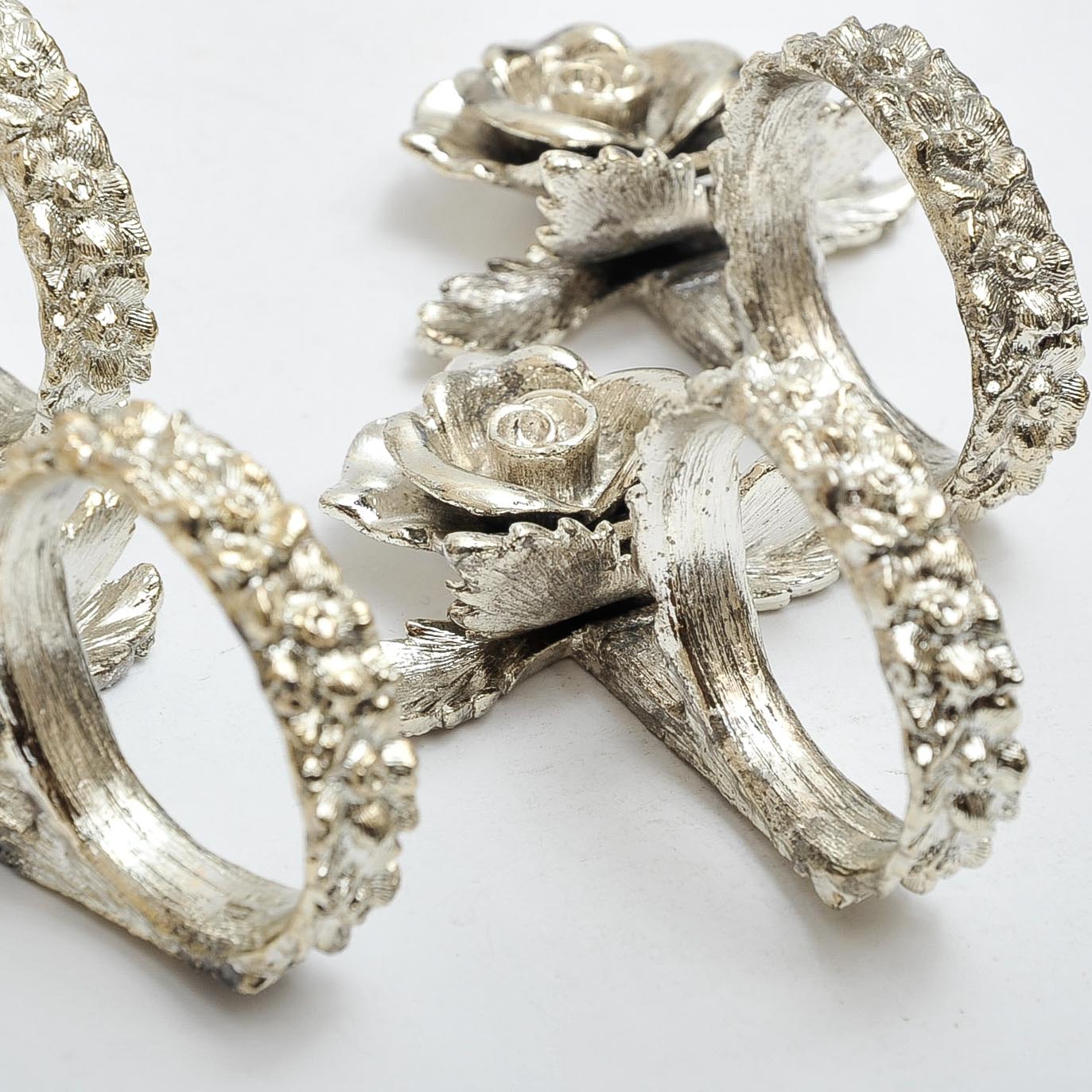 Eight Silver-Tone Rose Napkin Rings