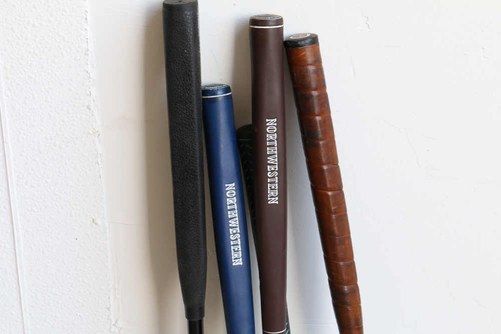 Group of Golf Clubs and Accessories