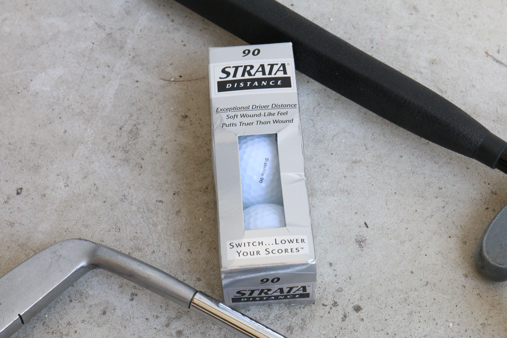 Group of Golf Clubs and Accessories