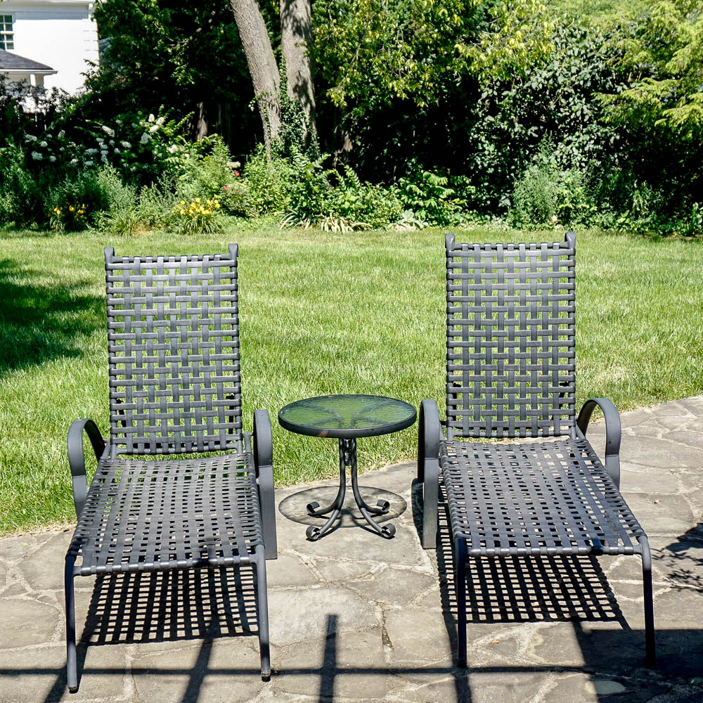 Outdoor Lounge Chairs and Glass Top Accent Table