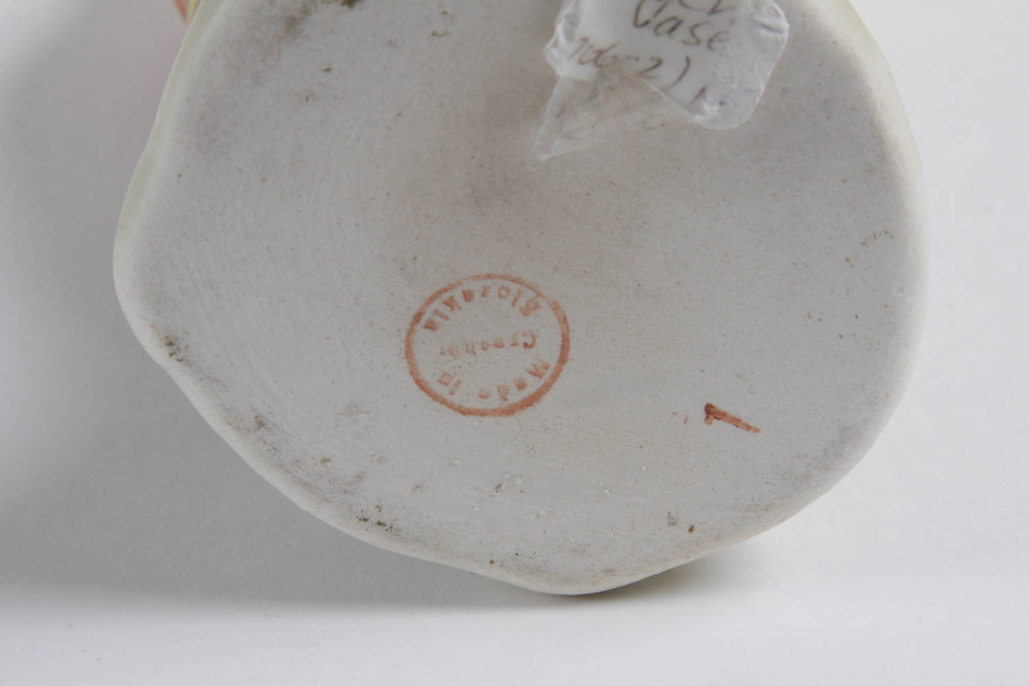 Set of Colorful Plates and Ceramic Birds