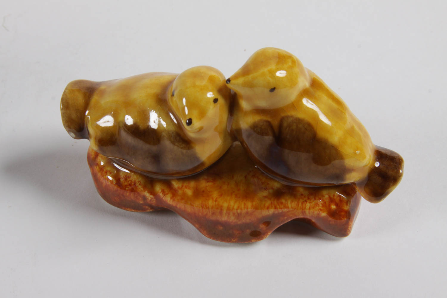 Set of Colorful Plates and Ceramic Birds