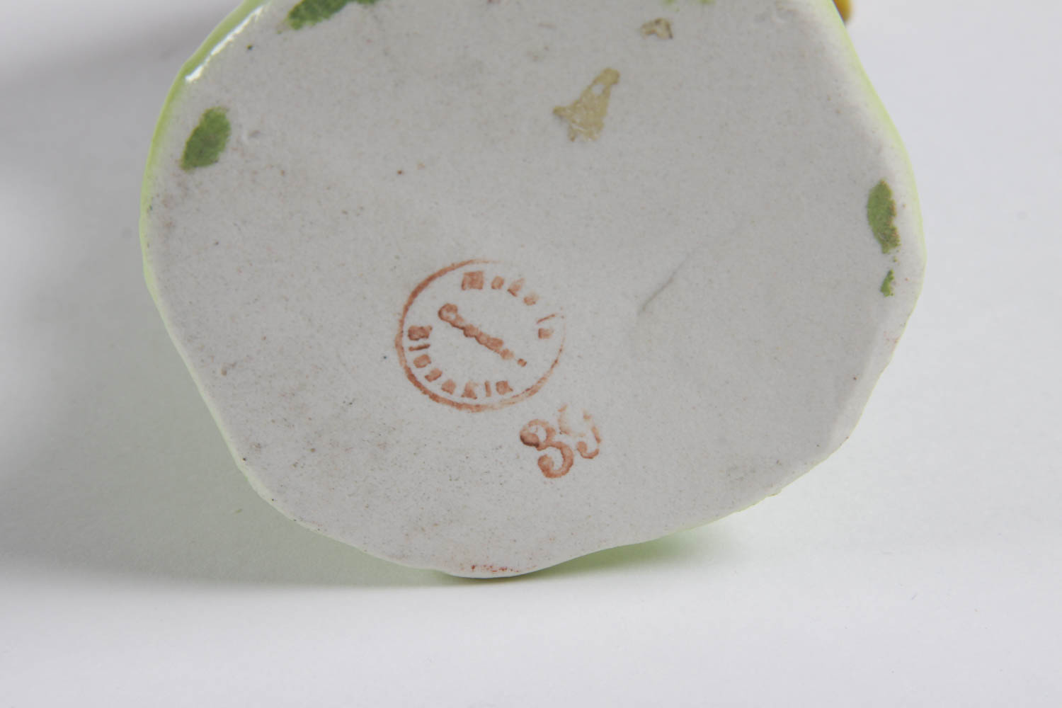 Set of Colorful Plates and Ceramic Birds