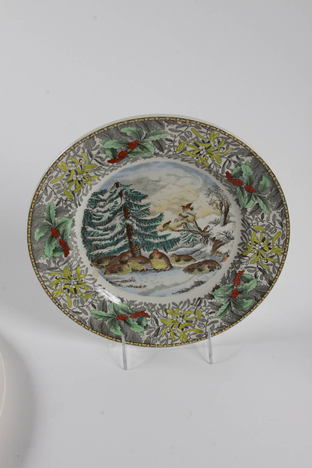 Set of Colorful Plates and Ceramic Birds