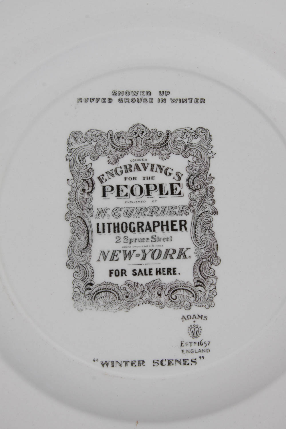 Set of Colorful Plates and Ceramic Birds