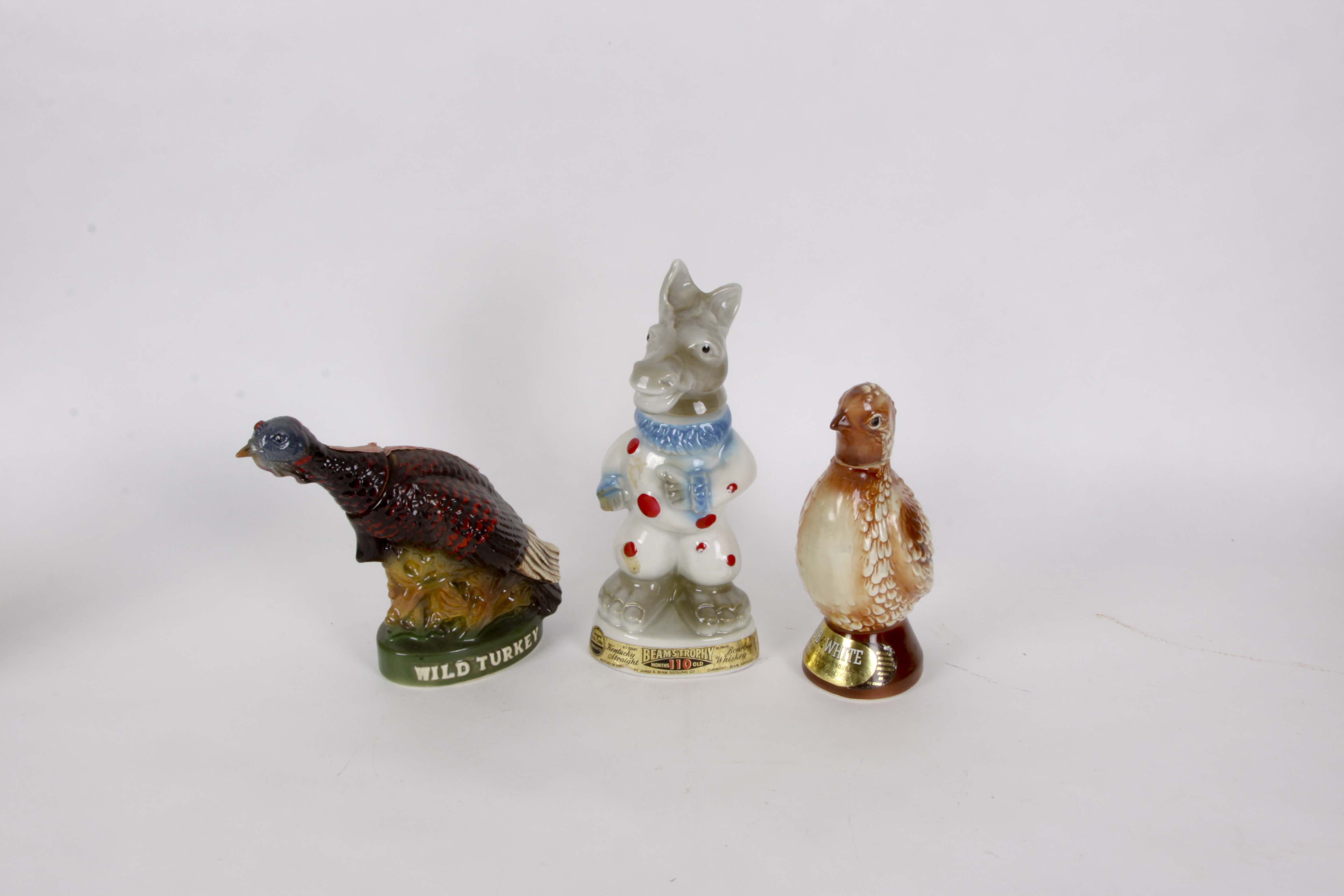 Three Ceramic Animal Whiskey Decanters