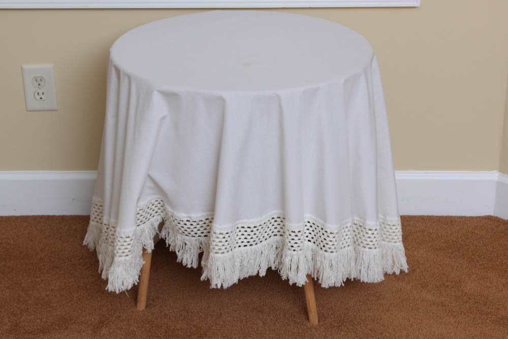 Wood Double Tier Table with White Tablecloth