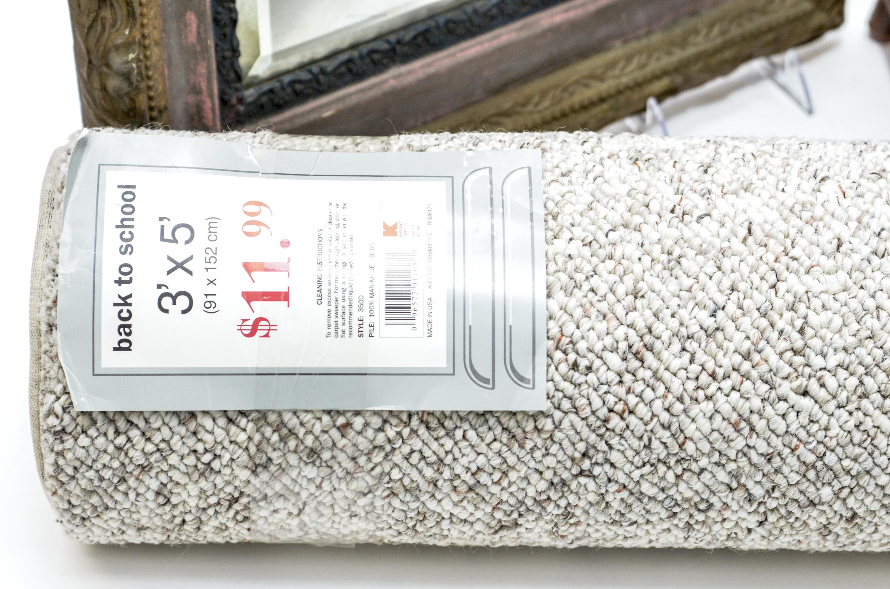 Cane Magazine Rack, Vintage Beveled Mirror and Area Rug