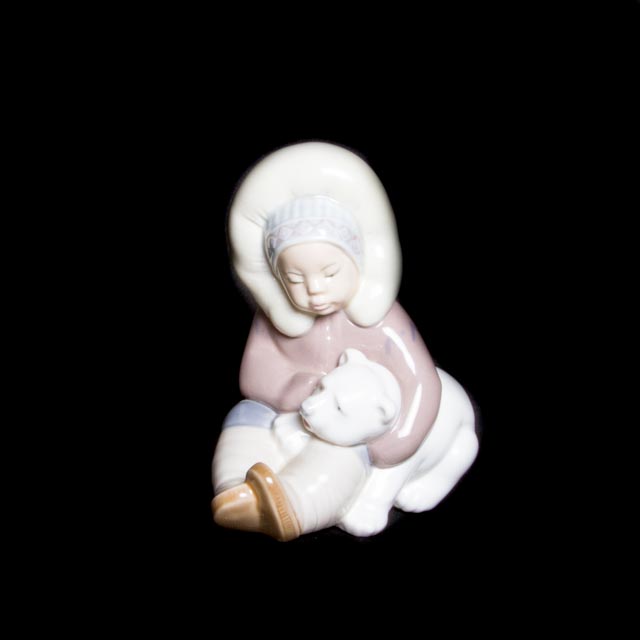 Lladro "Eskimo Boy Playing with Polar Bear Cub" Figurine