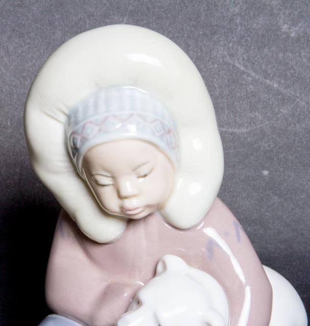 Lladro "Eskimo Boy Playing with Polar Bear Cub" Figurine