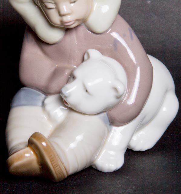 Lladro "Eskimo Boy Playing with Polar Bear Cub" Figurine