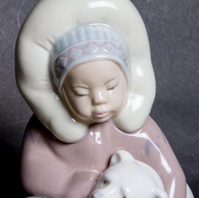 Lladro "Eskimo Boy Playing with Polar Bear Cub" Figurine