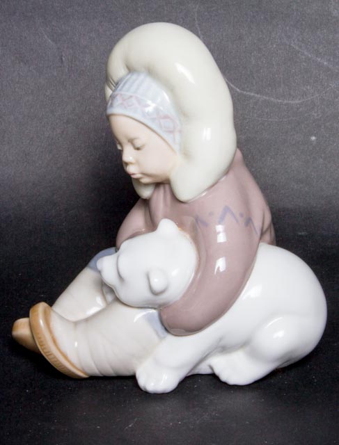 Lladro "Eskimo Boy Playing with Polar Bear Cub" Figurine