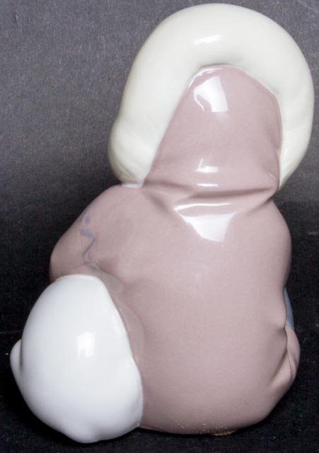 Lladro "Eskimo Boy Playing with Polar Bear Cub" Figurine