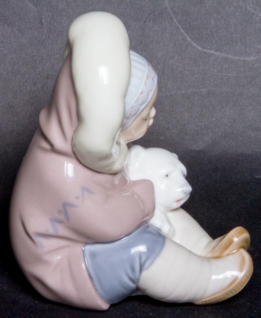 Lladro "Eskimo Boy Playing with Polar Bear Cub" Figurine