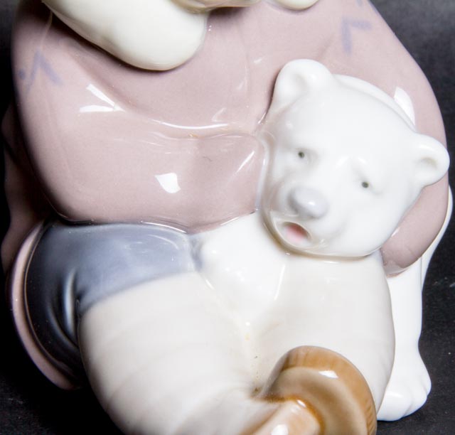 Lladro "Eskimo Boy Playing with Polar Bear Cub" Figurine