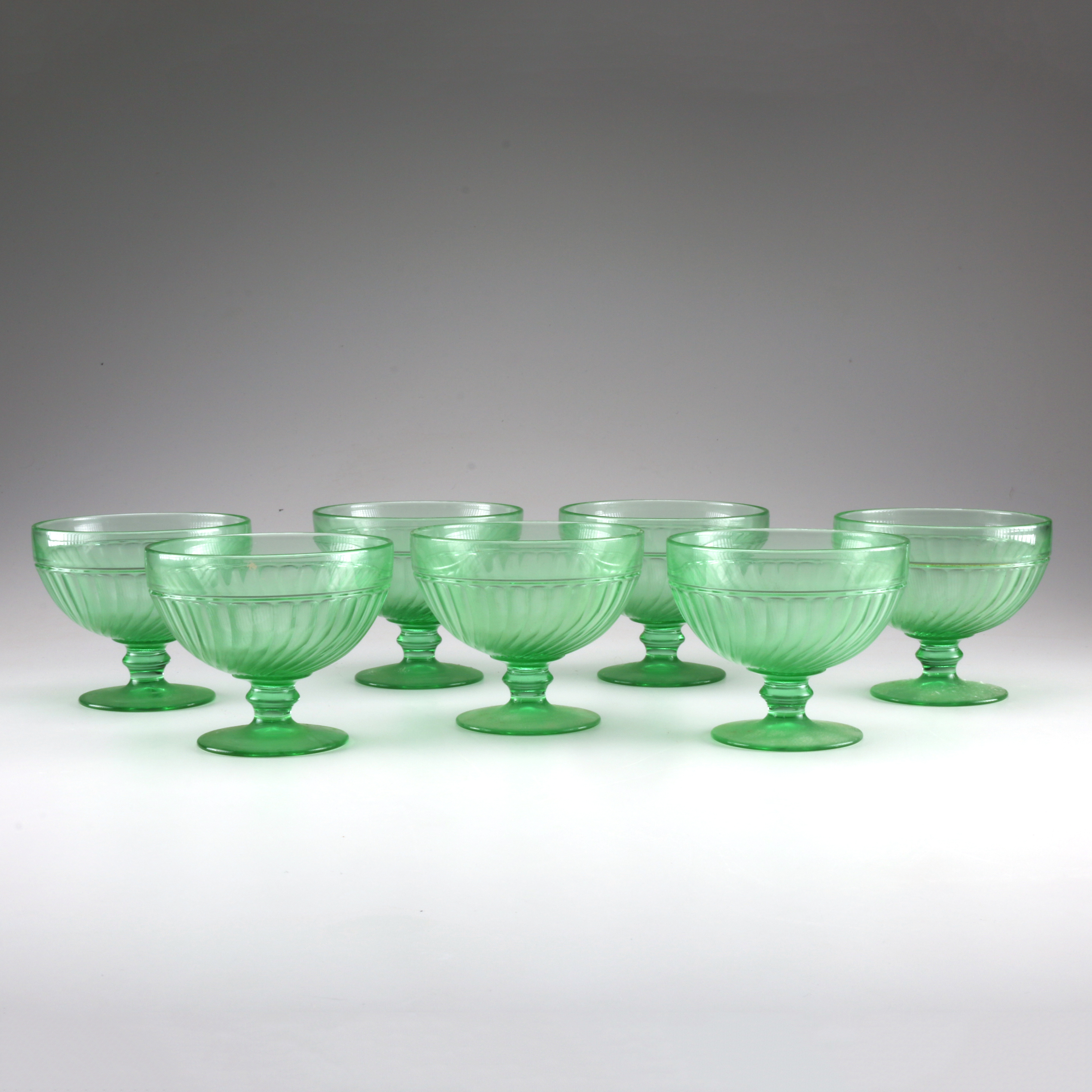 Optic Twist Green Depression Glass with Other Elegant Green Glassware