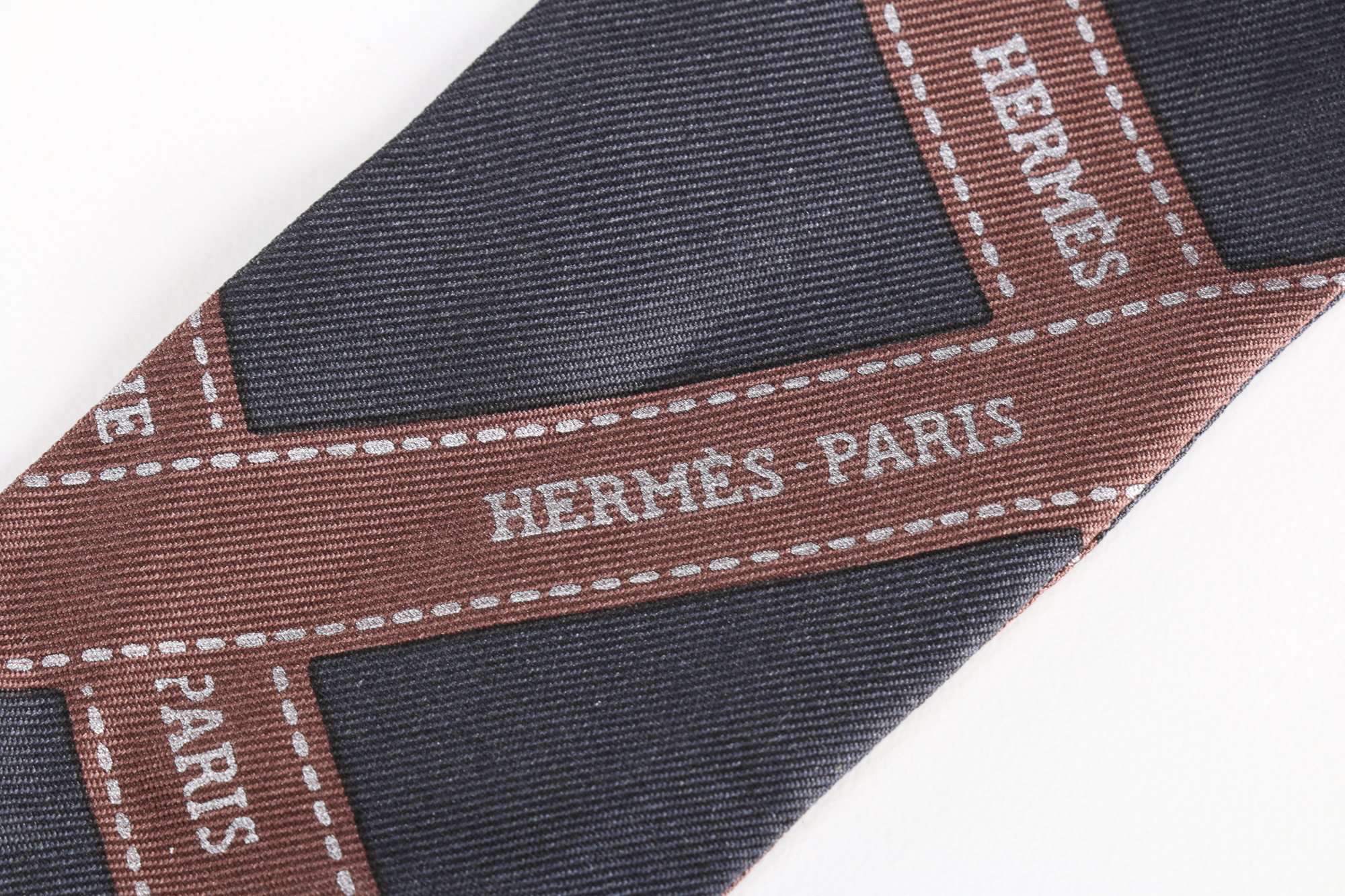 Hermès Twilly Scarf with Palladium Silver Tone Scarf rings.