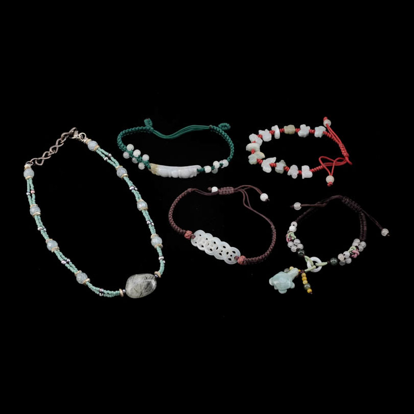 Four Jadeite Carving and Beaded Handmade Bracelets and a Tourmalinated Quartz Necklace with Plastic Beads