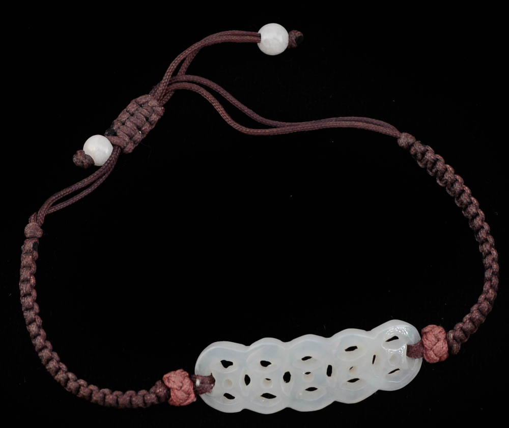 Four Jadeite Carving and Beaded Handmade Bracelets and a Tourmalinated Quartz Necklace with Plastic Beads