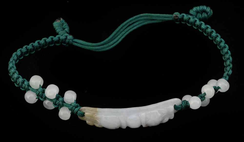 Four Jadeite Carving and Beaded Handmade Bracelets and a Tourmalinated Quartz Necklace with Plastic Beads