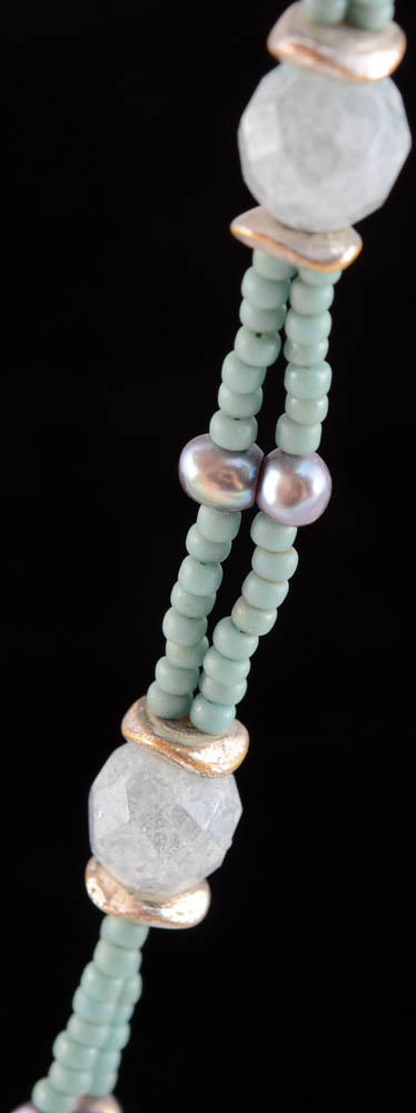 Four Jadeite Carving and Beaded Handmade Bracelets and a Tourmalinated Quartz Necklace with Plastic Beads