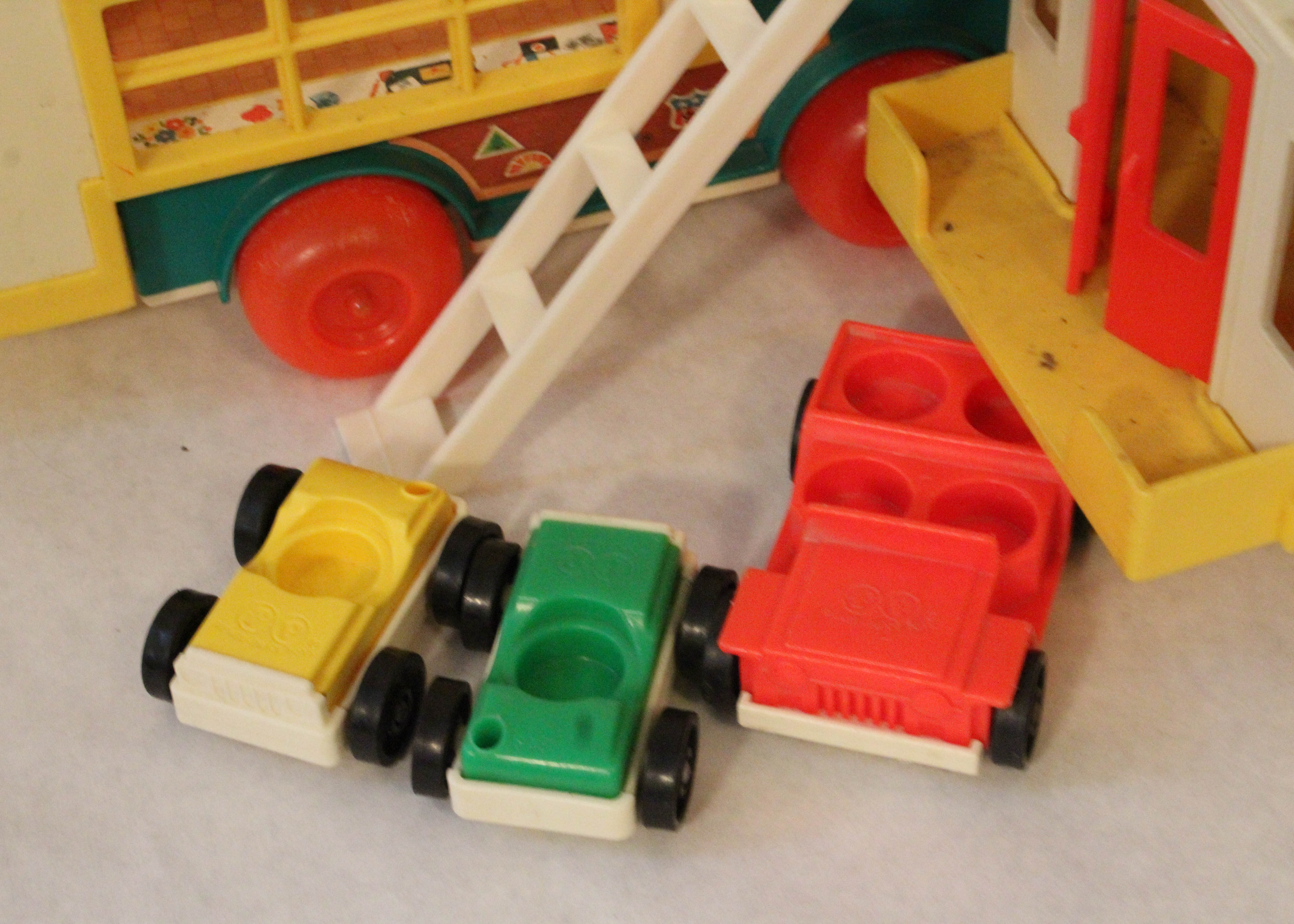 Collection of Vintage Fisher-Price Vehicles