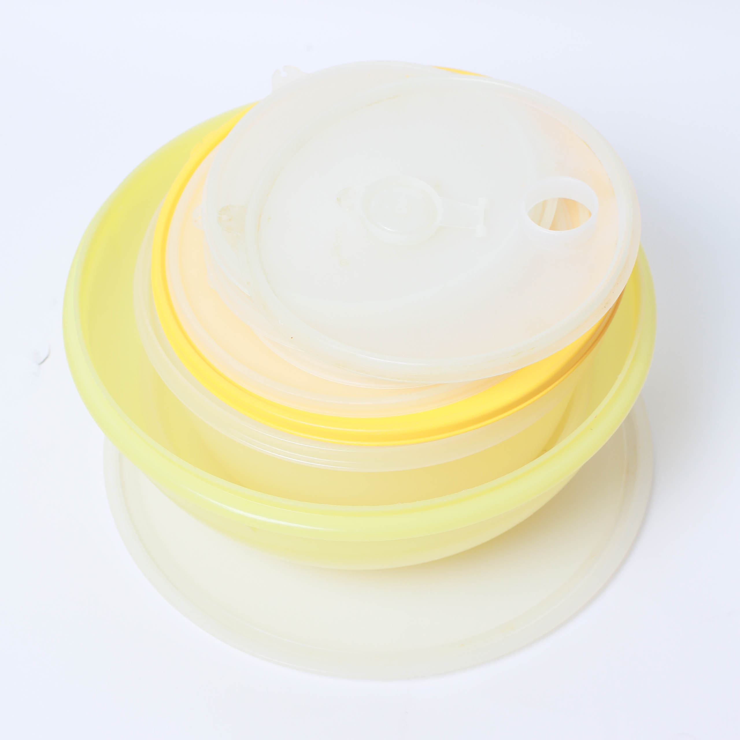 Collection of Food Storage Containers and Measuring Utensiles