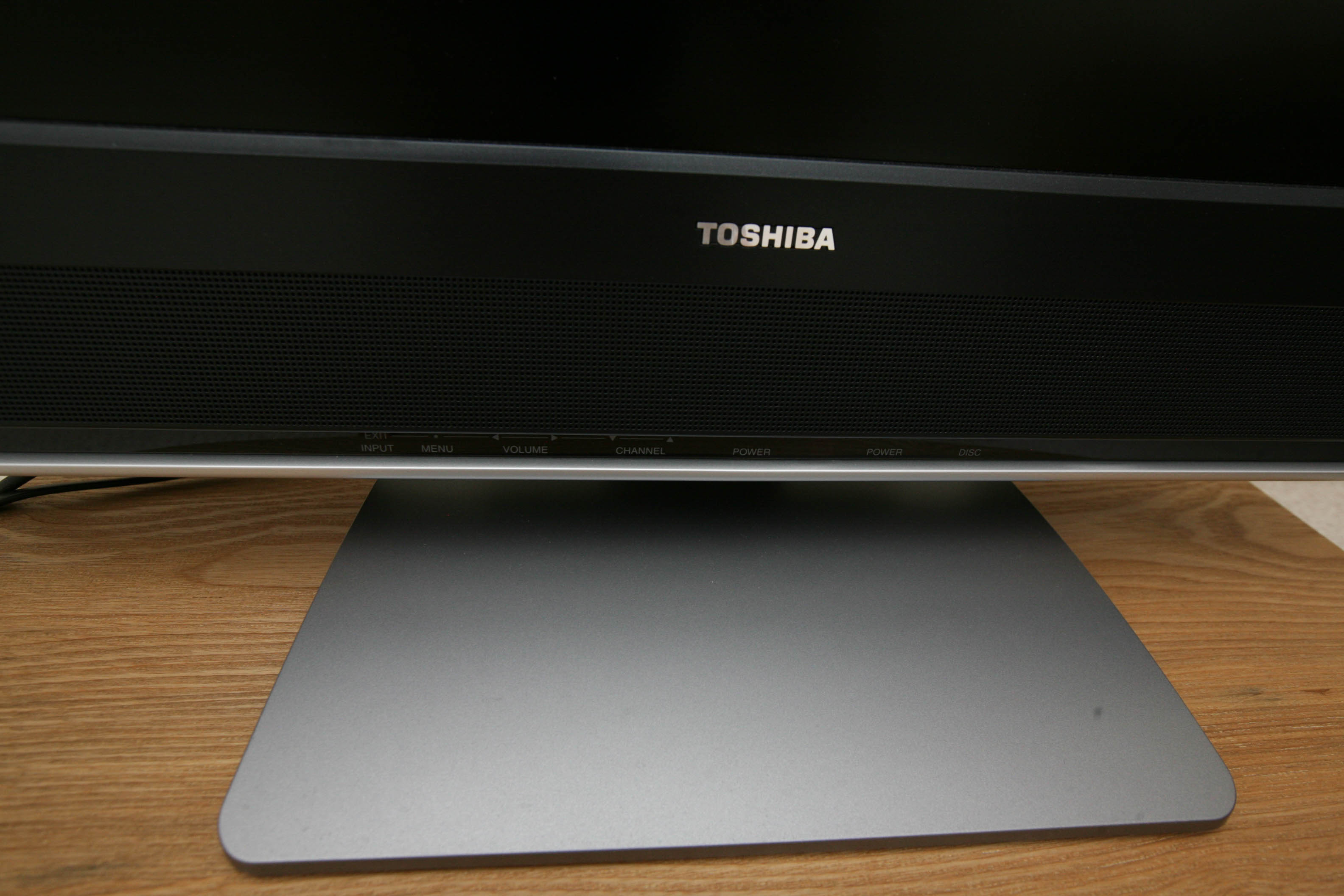 Twenty-Six Inch Toshiba Television/DVD Player and Small Wooden Stand