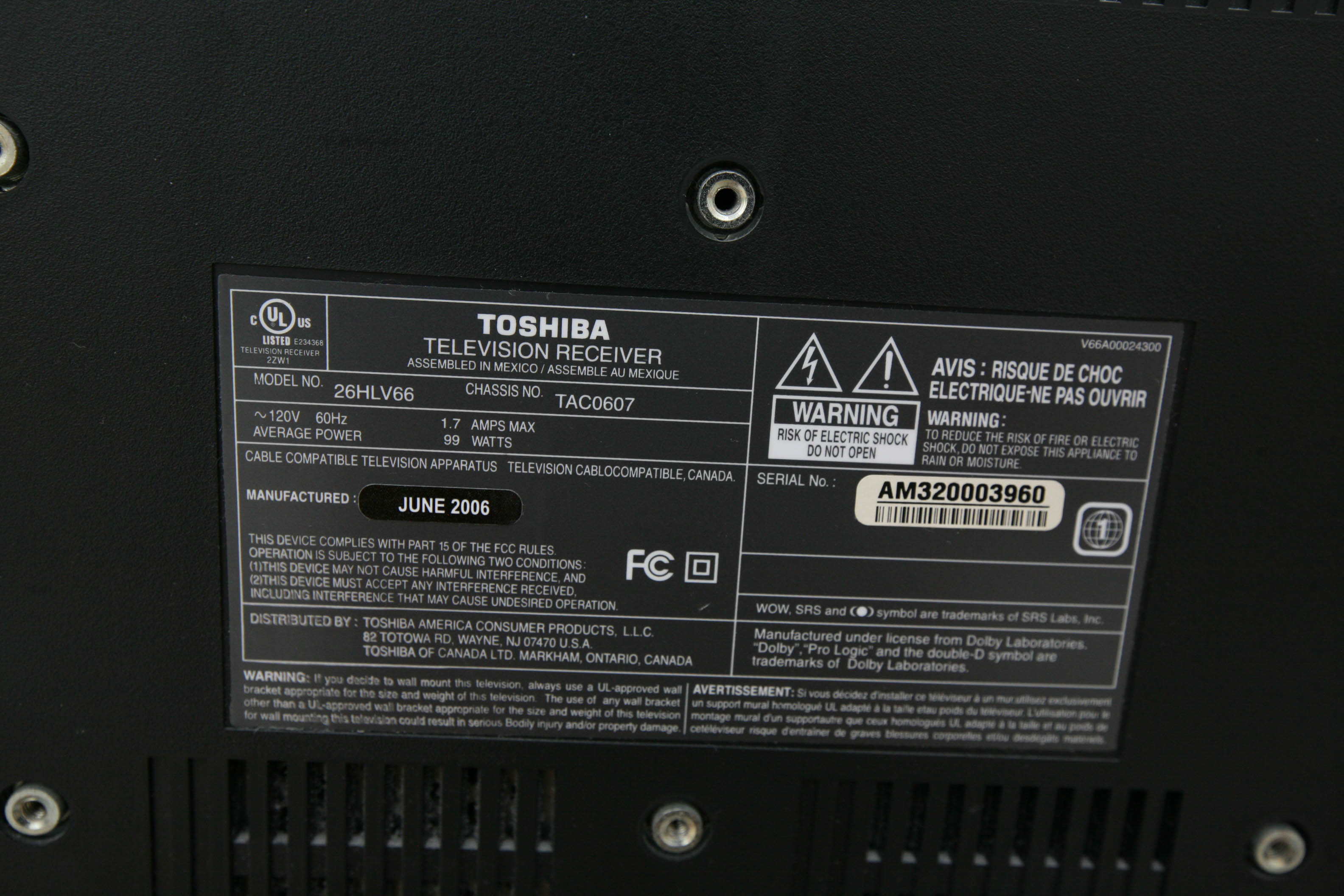 Twenty-Six Inch Toshiba Television/DVD Player and Small Wooden Stand