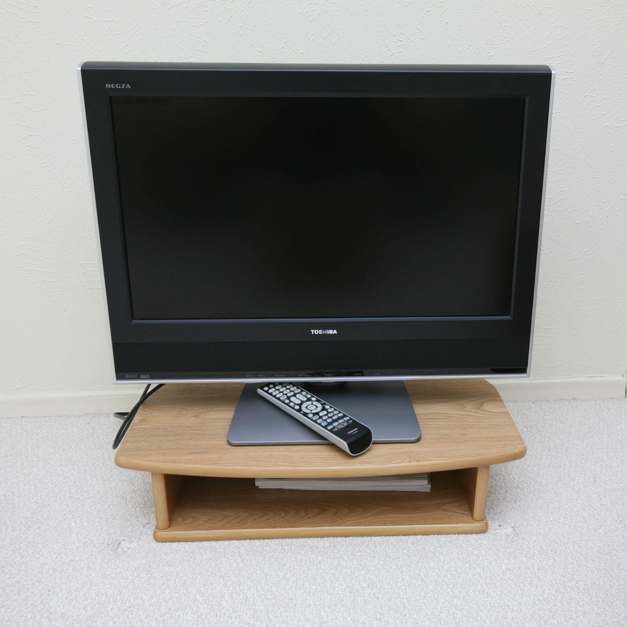 Twenty-Six Inch Toshiba Television/DVD Player and Small Wooden Stand