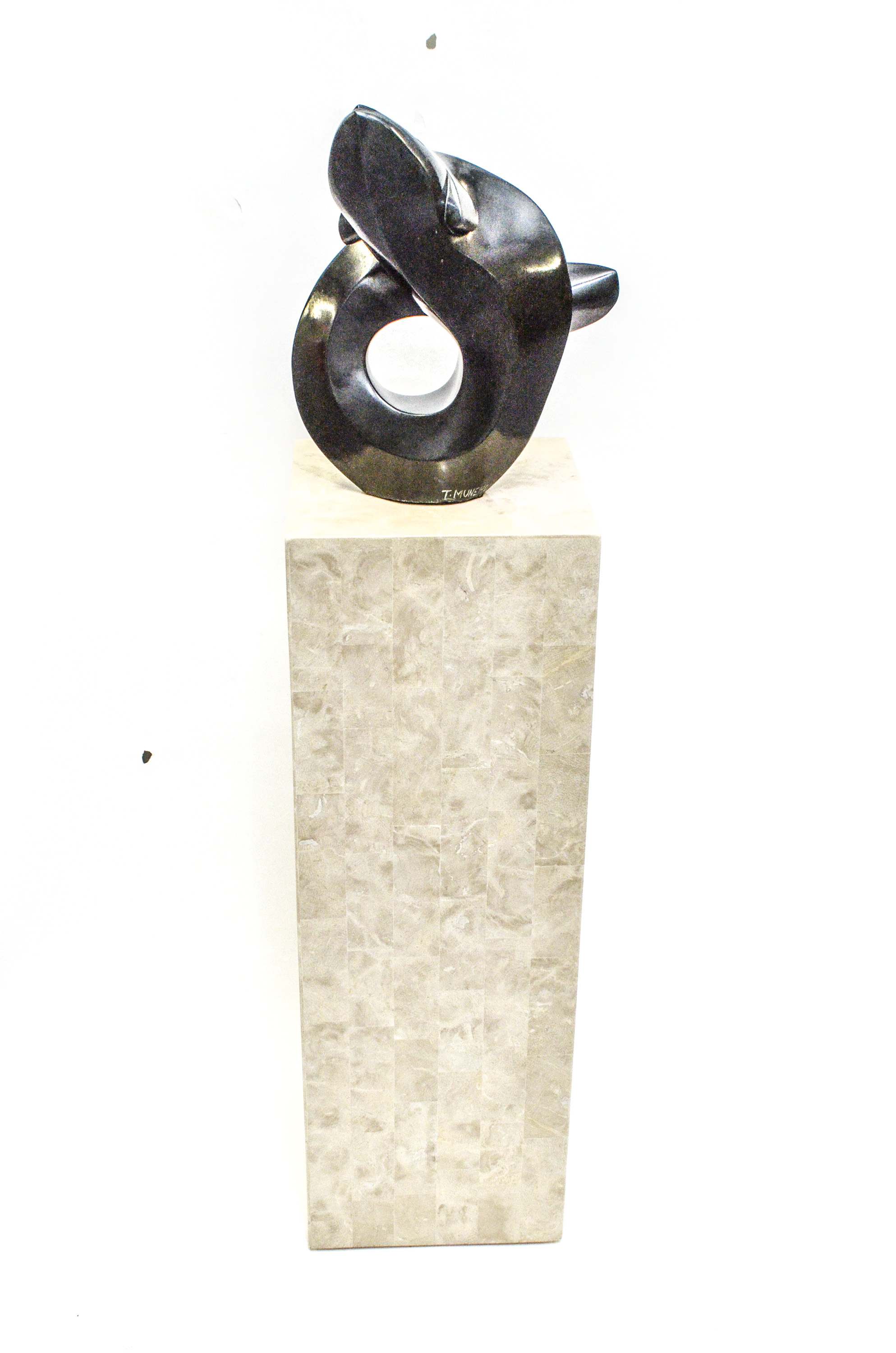 Black Stone Sculpture by T. Munemo titled "Water Spirit"