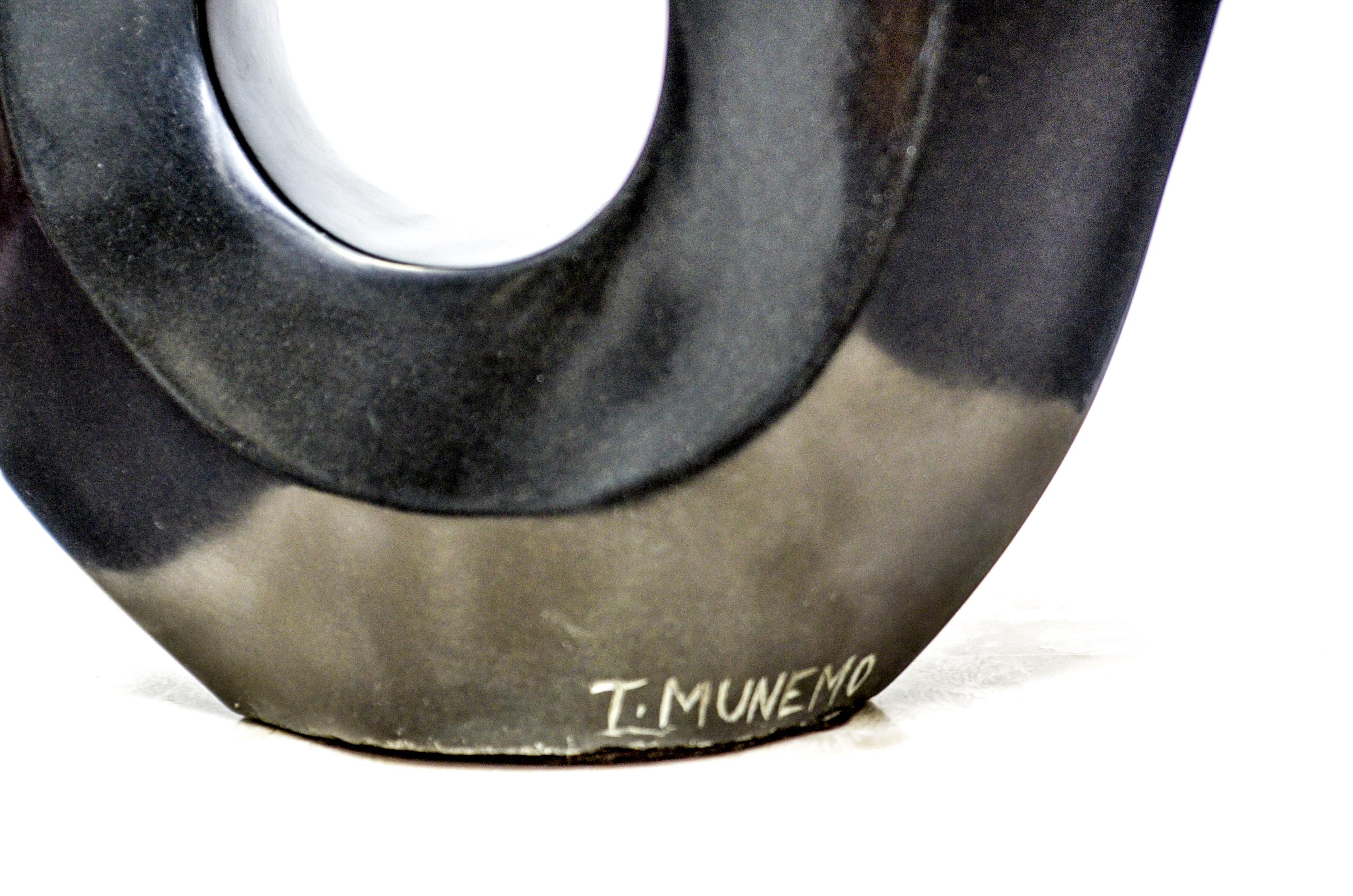 Black Stone Sculpture by T. Munemo titled "Water Spirit"